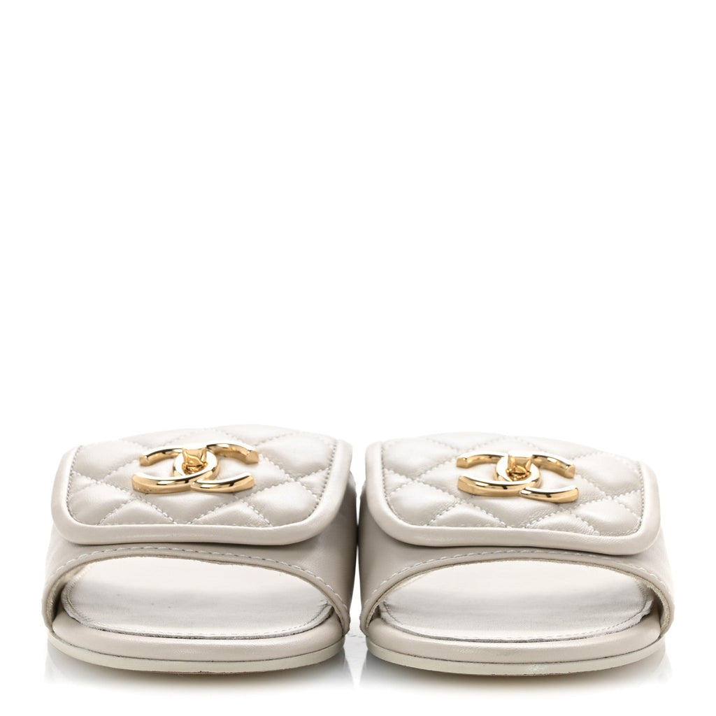 Lambskin Quilted Turnlock Flat Mules 35.5 Light Grey